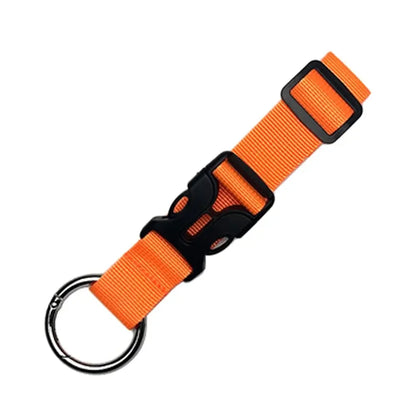 Portable travel luggage strap for securing bags and jackets to suitcases.