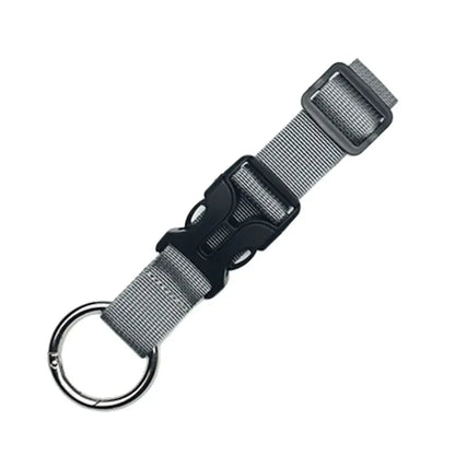 Portable travel luggage strap for securing bags and jackets to suitcases.